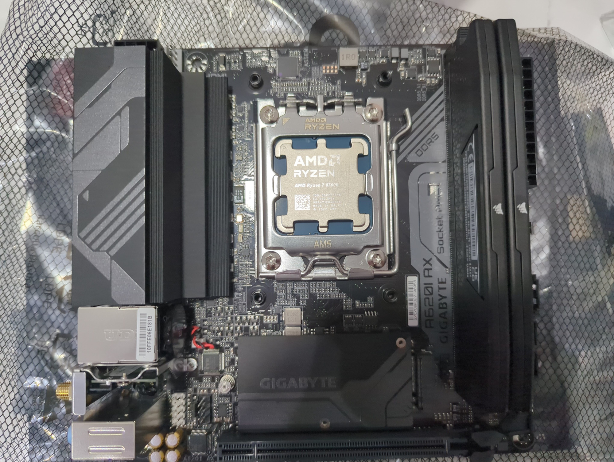 Motherboard, RAM and CPU all seated in the board before case mounting